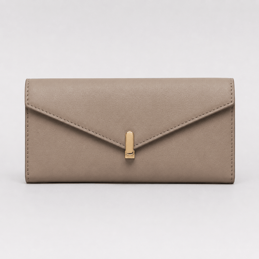 Beige wallet with a gold clasp on a light gray background