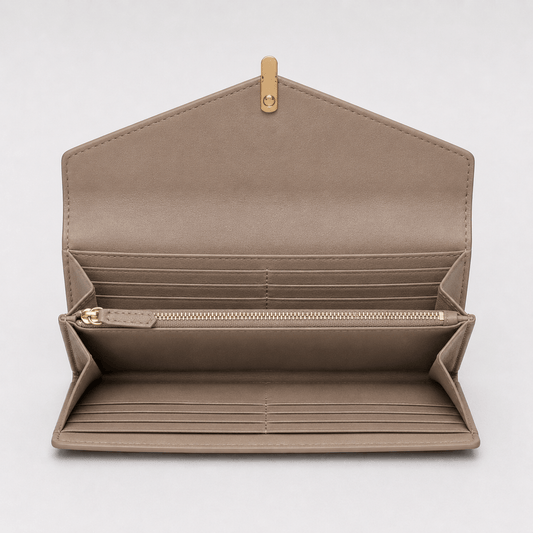 Open beige wallet with gold zipper on a light gray background